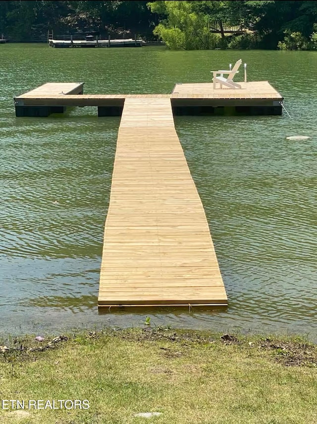 view of dock featuring a water view