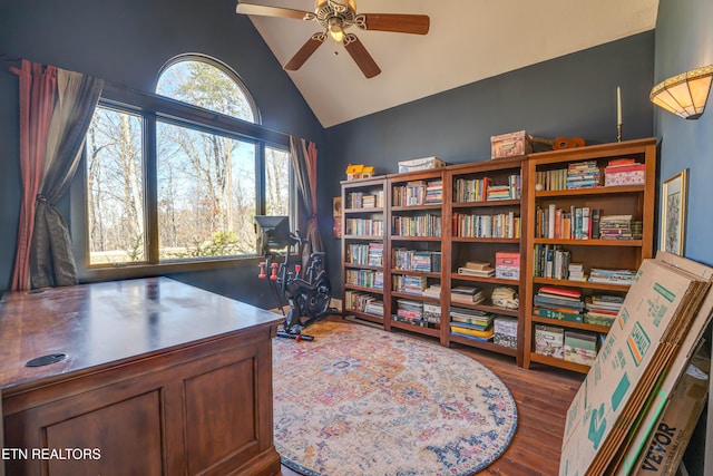 office area featuring ceiling fan, dark hardwood / wood-style flooring, and vaulted ceiling