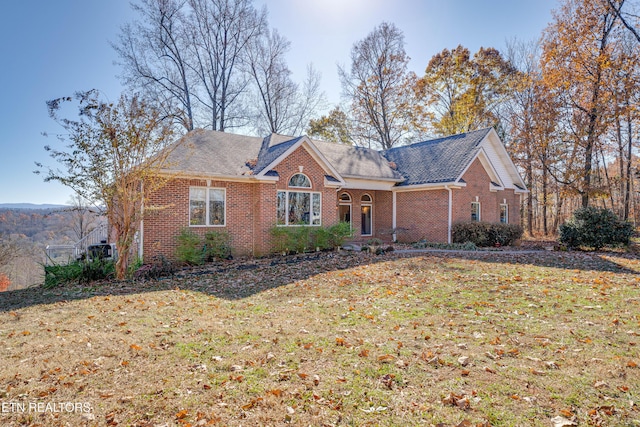 view of front of home with a front lawn