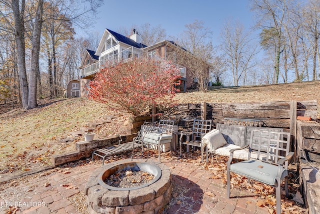 view of patio featuring a fire pit