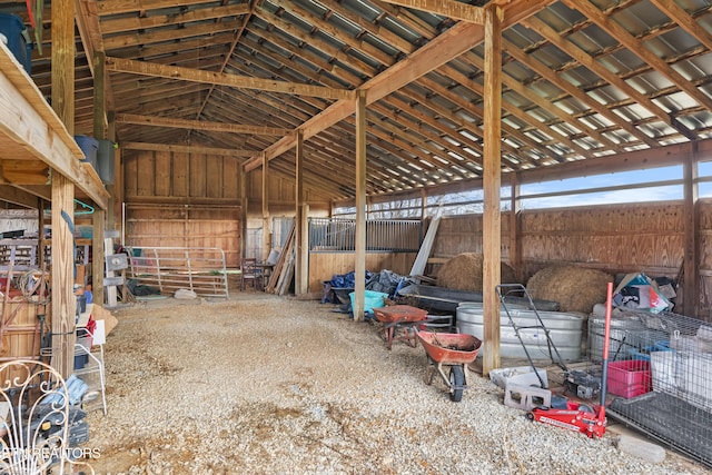 miscellaneous room with lofted ceiling