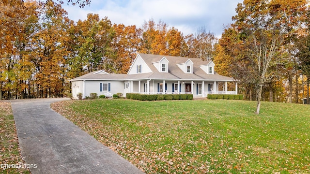 view of front facade featuring a porch and a front yard