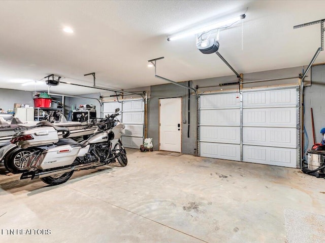 garage featuring a garage door opener