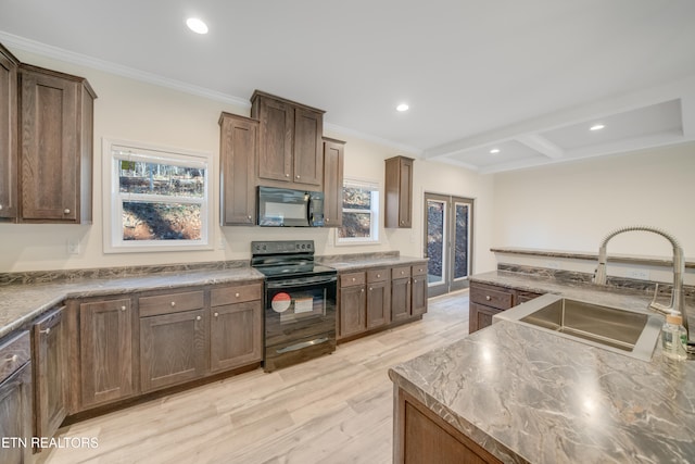 kitchen with sink, crown molding, light wood-type flooring, beam ceiling, and black appliances