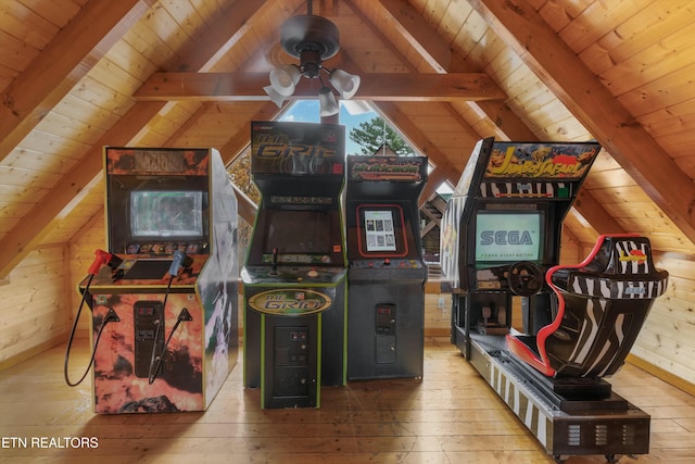 recreation room featuring vaulted ceiling with beams, wooden walls, hardwood / wood-style floors, and wooden ceiling