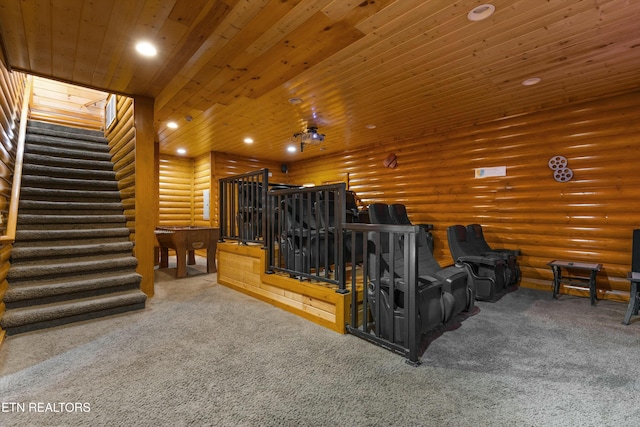 carpeted home theater featuring log walls and wooden ceiling