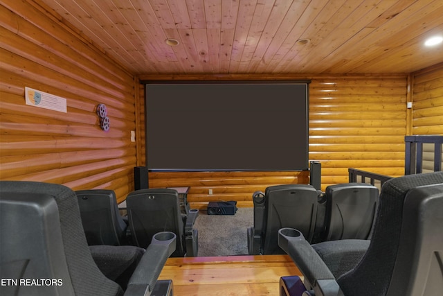 cinema featuring log walls and wooden ceiling