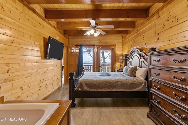 1707 High Rock Way, Sevierville, TN 37862 - bedroom featuring wooden walls, access to outside, wooden ceiling with exposed beams, and light wood finished floors