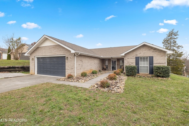 single story home with a front yard and a garage