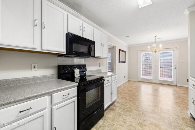 kitchen with ornamental molding, black appliances, pendant lighting, a chandelier, and white cabinetry