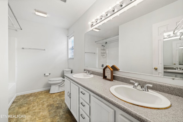 full bathroom with washtub / shower combination, vanity, and toilet