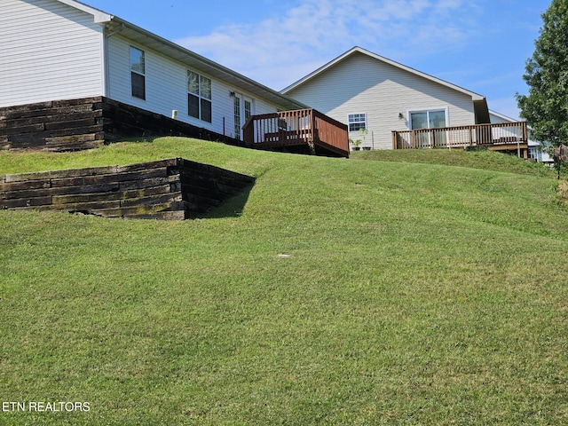 view of yard featuring a deck