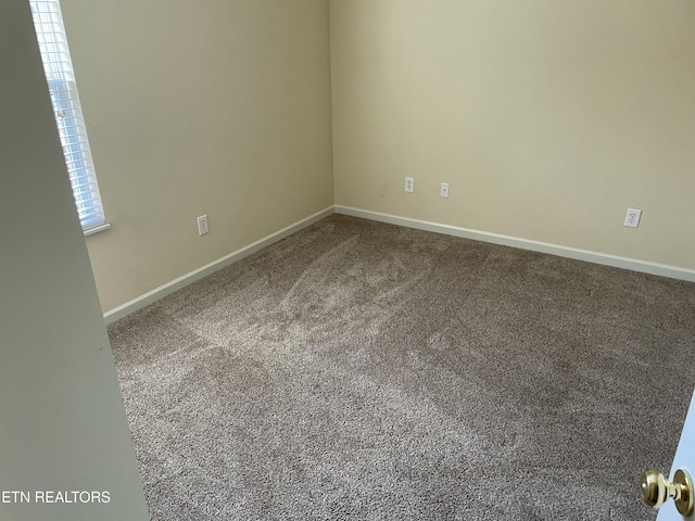 view of carpeted spare room