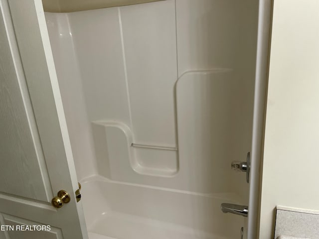 bathroom featuring tub / shower combination