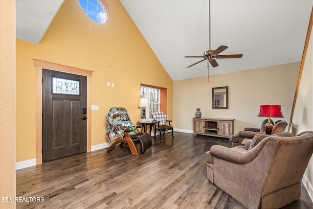 living room with ceiling fan, hardwood / wood-style floors, high vaulted ceiling, and plenty of natural light