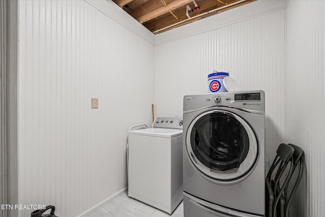 laundry room featuring washer and clothes dryer