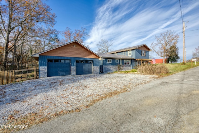 view of front of property featuring a garage