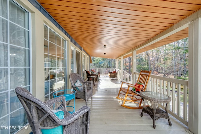 wooden terrace with covered porch