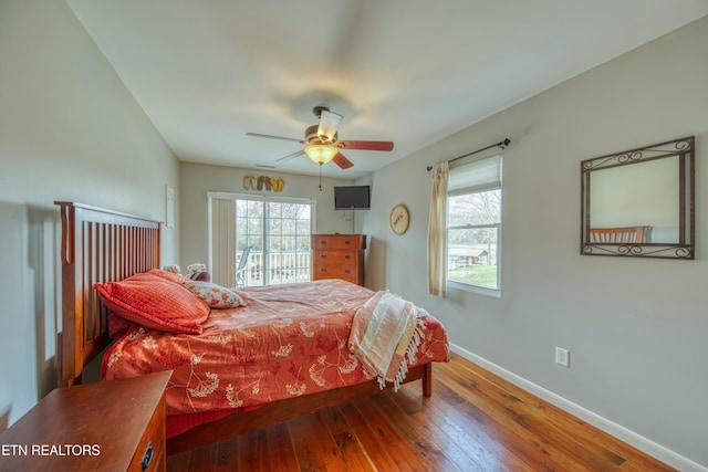 bedroom with wood-type flooring and ceiling fan