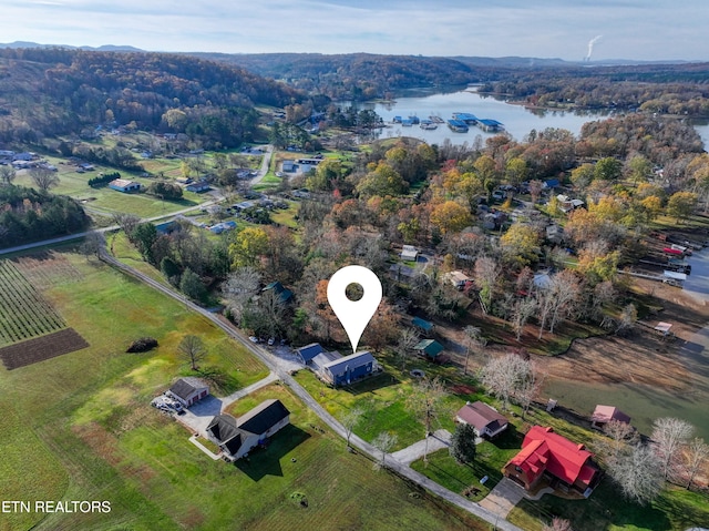 aerial view featuring a rural view and a water view