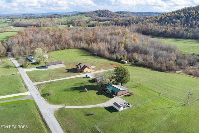 birds eye view of property featuring a rural view