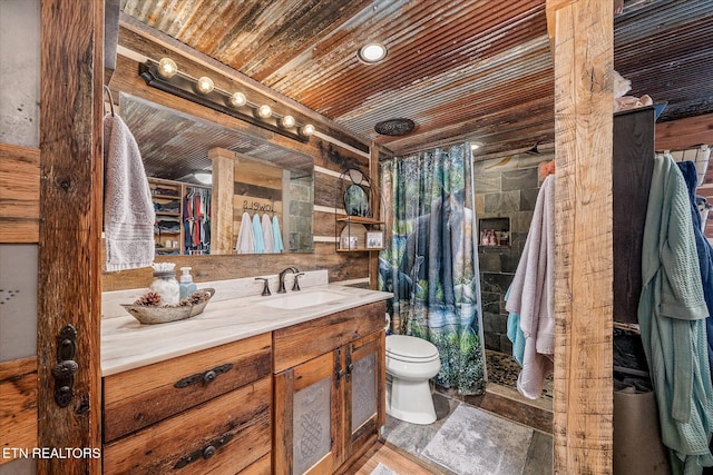 bathroom featuring wooden ceiling, a shower with curtain, hardwood / wood-style floors, toilet, and vanity