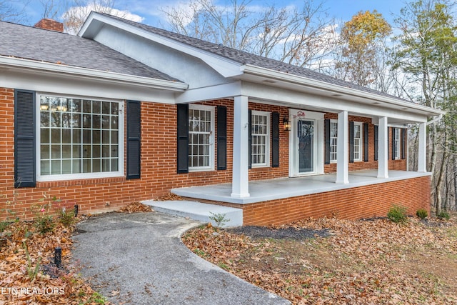 view of home's exterior featuring covered porch