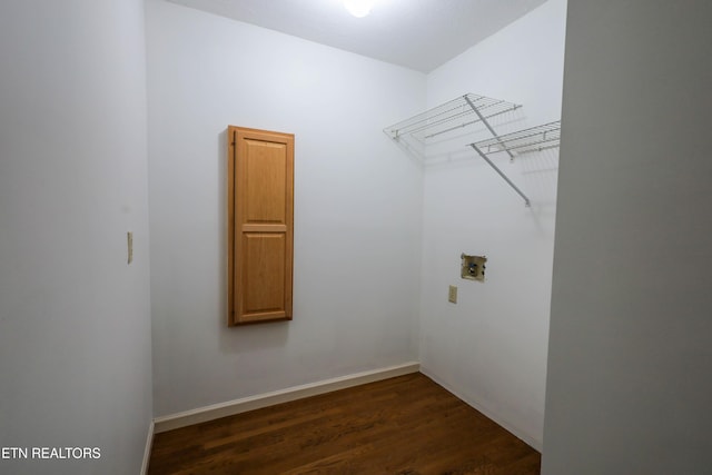 washroom featuring washer hookup and dark hardwood / wood-style floors