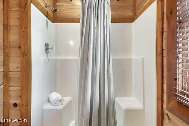 bathroom with curtained shower