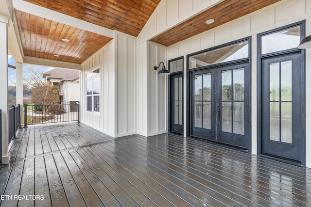 wooden terrace featuring french doors