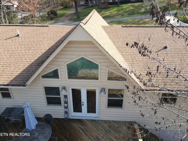 exterior space with french doors and a wooden deck