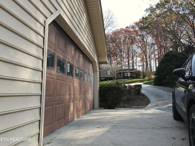 exterior space with a garage