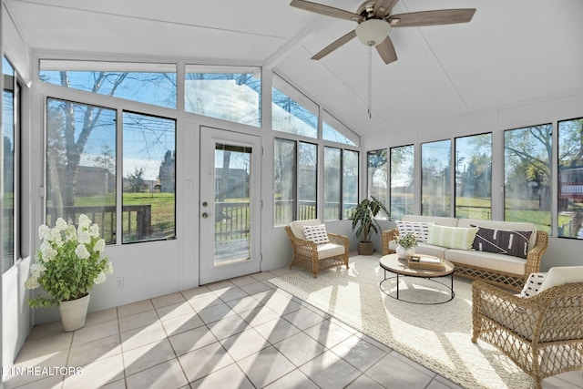 sunroom / solarium featuring vaulted ceiling and ceiling fan