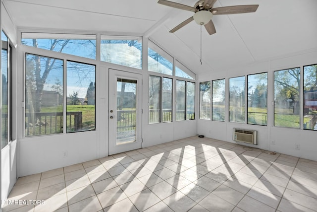 unfurnished sunroom featuring a wall mounted air conditioner, ceiling fan, and lofted ceiling