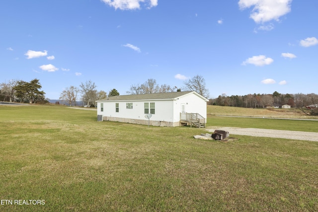 view of front of home featuring a front lawn