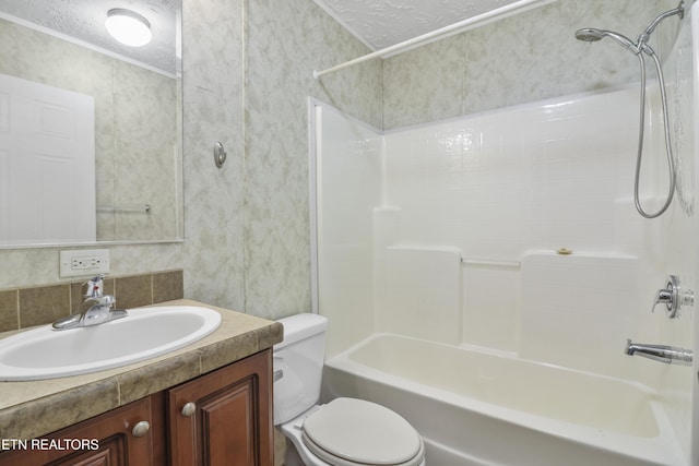 full bathroom featuring vanity, toilet, shower / bath combination, and a textured ceiling