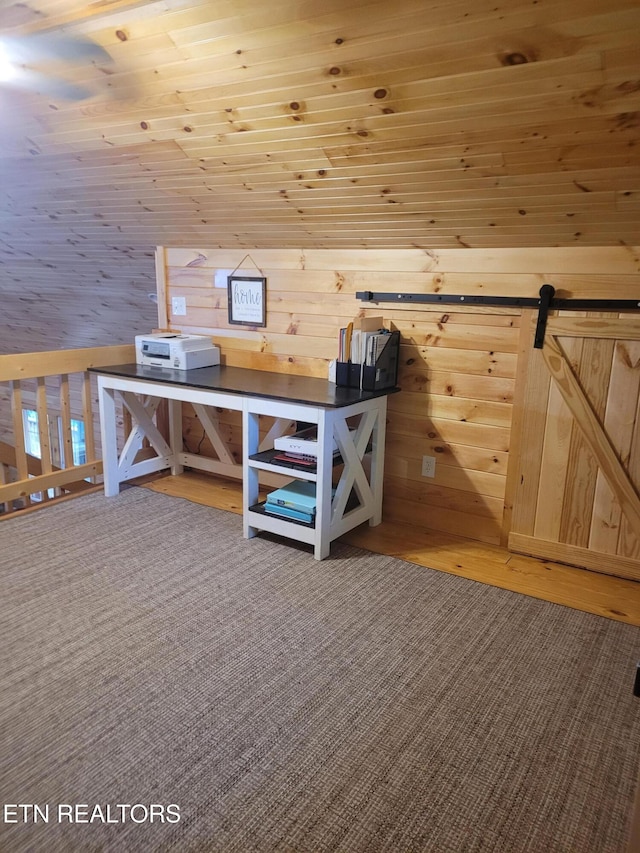 bonus room with a barn door