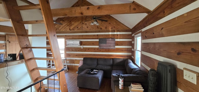 living room featuring hardwood / wood-style flooring, vaulted ceiling with beams, ceiling fan, and wooden walls