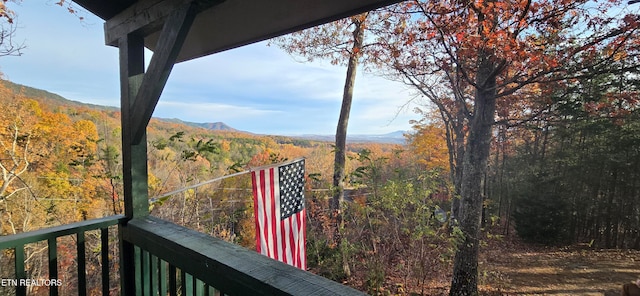 balcony featuring a mountain view