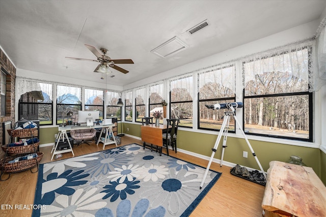 office area with wood-type flooring and ceiling fan