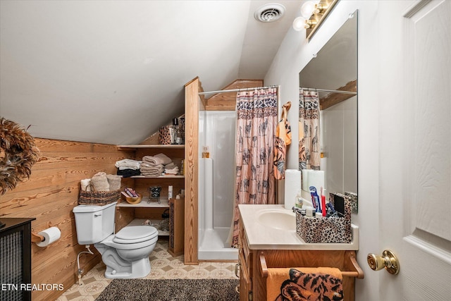 bathroom with a shower with curtain, vaulted ceiling, toilet, wooden walls, and vanity