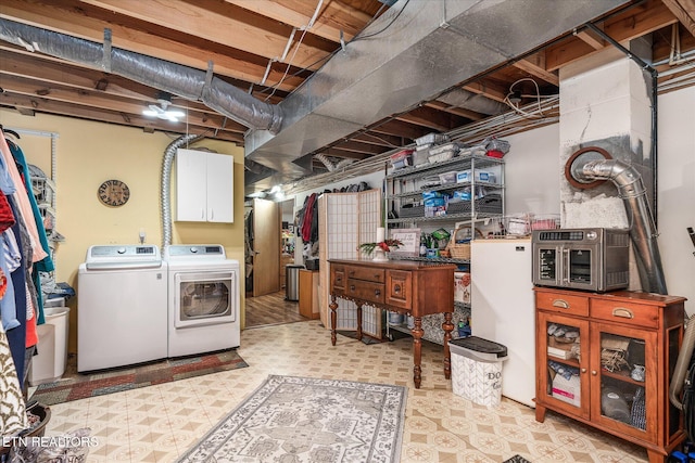 basement with separate washer and dryer