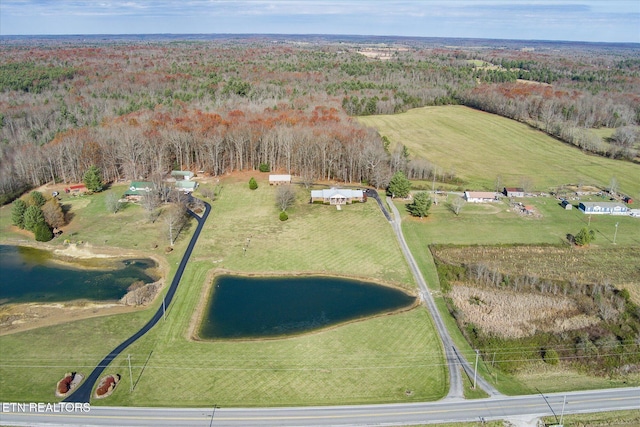 aerial view featuring a rural view and a water view