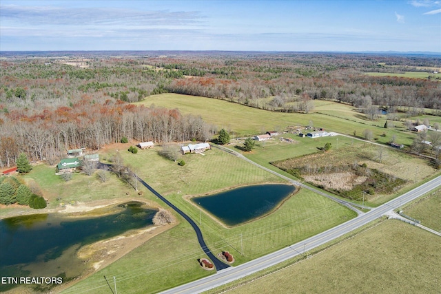 aerial view featuring a rural view and a water view