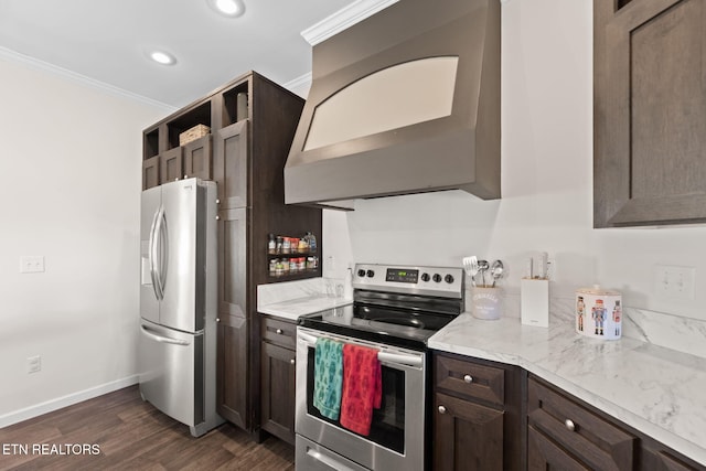 kitchen with dark wood-type flooring, stainless steel appliances, light stone counters, custom range hood, and ornamental molding