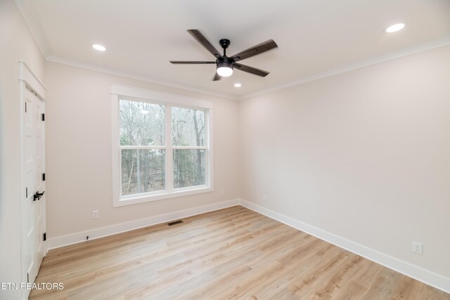 spare room featuring visible vents, recessed lighting, light wood-type flooring, and baseboards