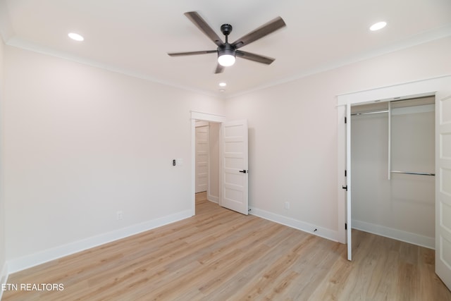 unfurnished bedroom with crown molding, recessed lighting, baseboards, and light wood finished floors