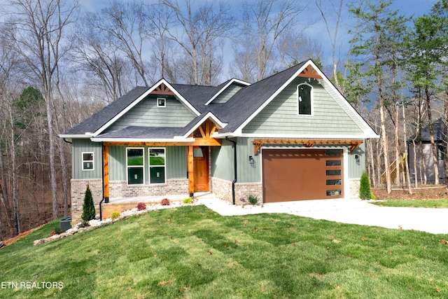 craftsman house featuring a front yard, driveway, a garage, board and batten siding, and brick siding