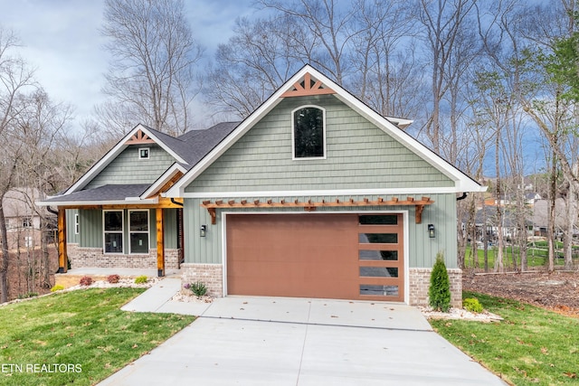 craftsman-style house with a front lawn, driveway, board and batten siding, a garage, and brick siding