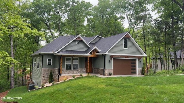 324 Nuhya Ln, Loudon, TN 37774 - craftsman house with board and batten siding, brick siding, a front lawn, and view of scattered trees